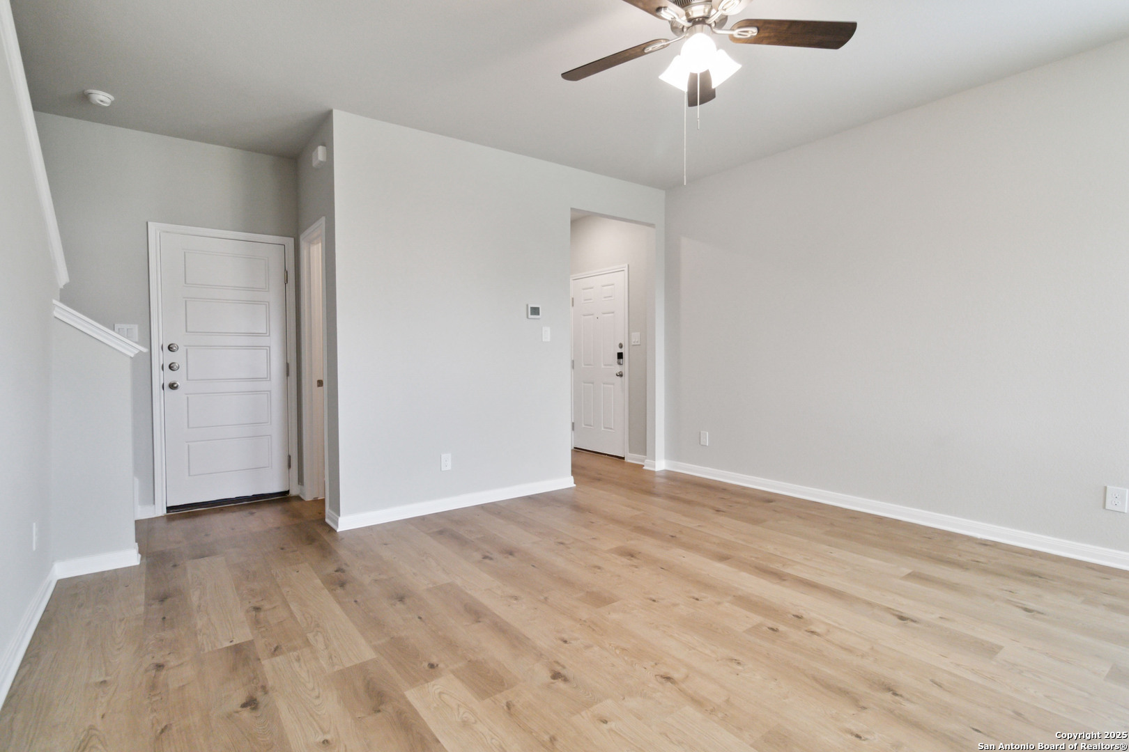5406 Devils Gate Converse, TX 78109 - Photo 6 of 28 a view of an empty room with wooden floor