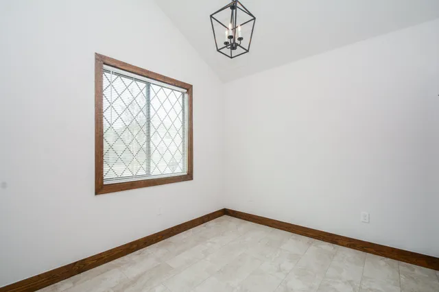 a view of a room with a window