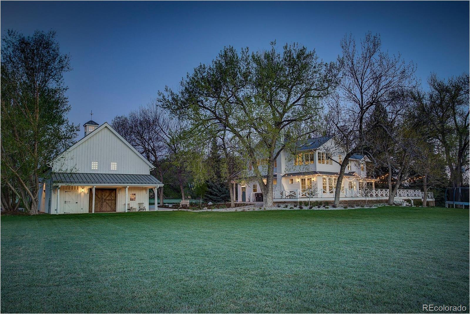10261 Arapahoe Road Lafayette, CO 80026 - Photo 1 of 35 a view of a house with a big yard