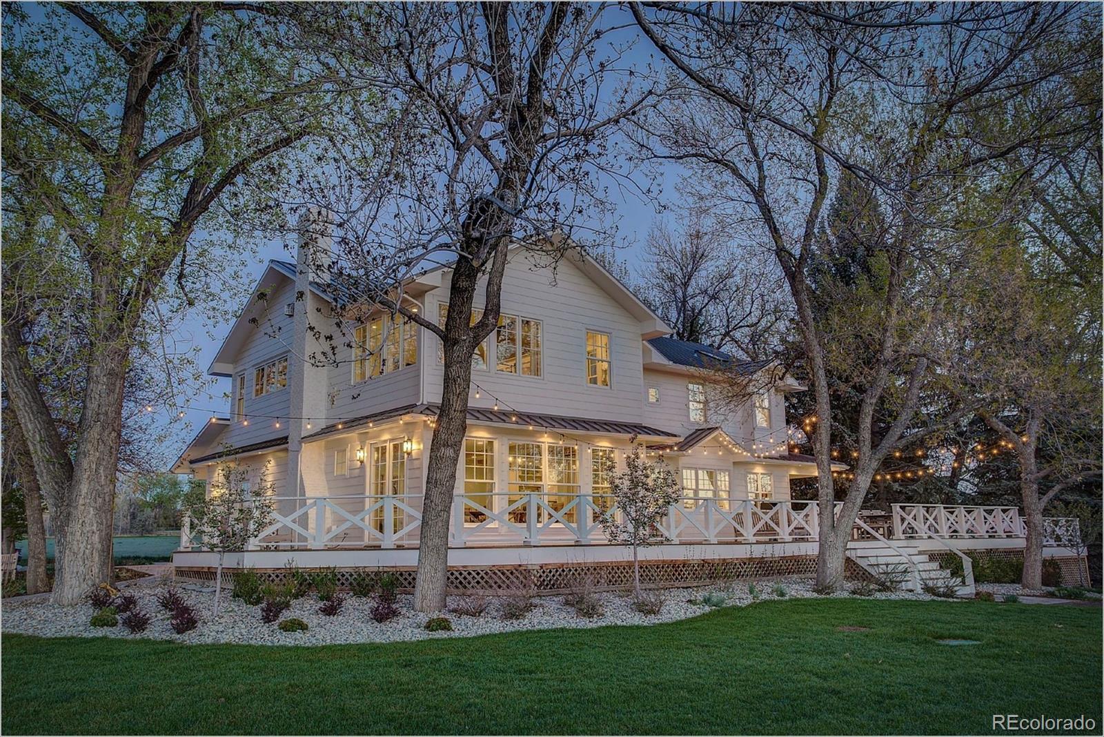 10261 Arapahoe Road Lafayette, CO 80026 - Photo 2 of 35 a front view of house with a garden