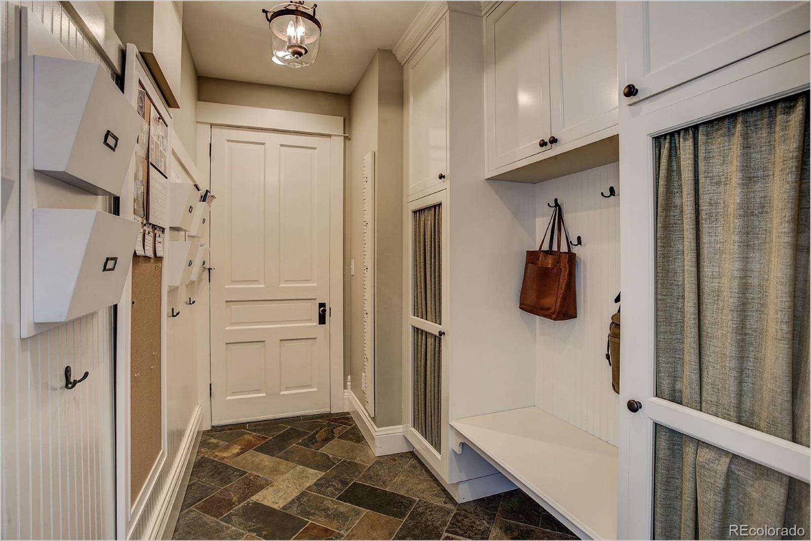 10261 Arapahoe Road Lafayette, CO 80026 - Photo 29 of 35 a bathroom with a tub and a shower