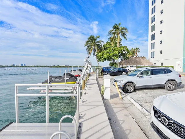 a view of a patio with table and chairs