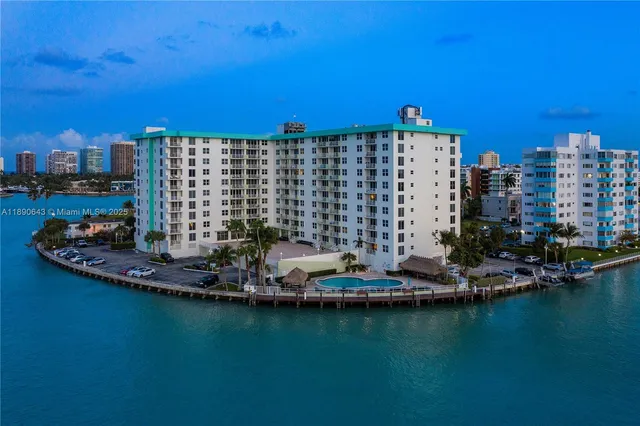 a view of a water with a building in the background