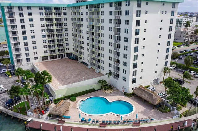 a view of a swimming pool and lake view