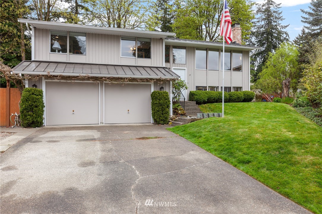22230 5th Place West Bothell, WA 98021 - Photo 1 of 34 a view of a house with backyard and garden