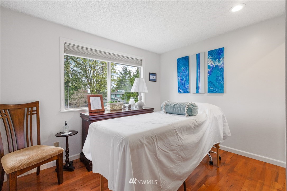 22230 5th Place West Bothell, WA 98021 - Photo 15 of 34 a bedroom with a bed and a window