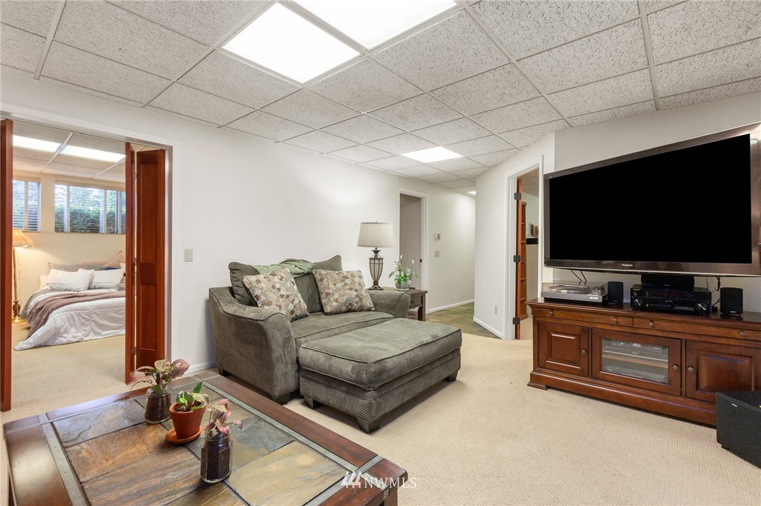 22230 5th Place West Bothell, WA 98021 - Photo 20 of 34 a living room with furniture and a flat screen tv