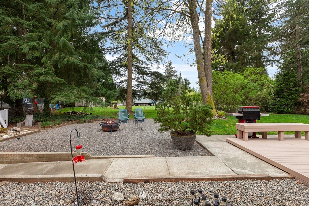 22230 5th Place West Bothell, WA 98021 - Photo 28 of 34 a view of a backyard with sitting area