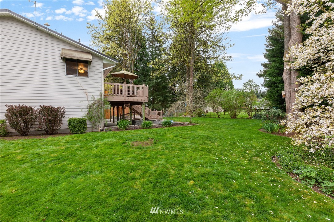 22230 5th Place West Bothell, WA 98021 - Photo 31 of 34 a view of a house with a backyard