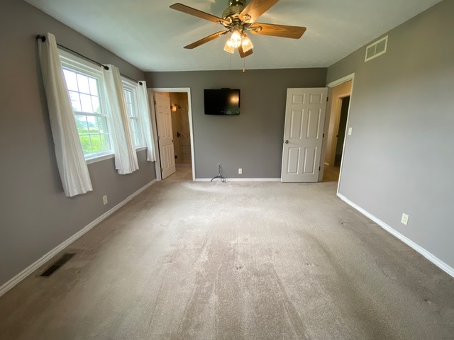 11426 East Radisson Road Mount Vernon, IL 62864 - Photo 21 of 56 an empty room with windows and closet