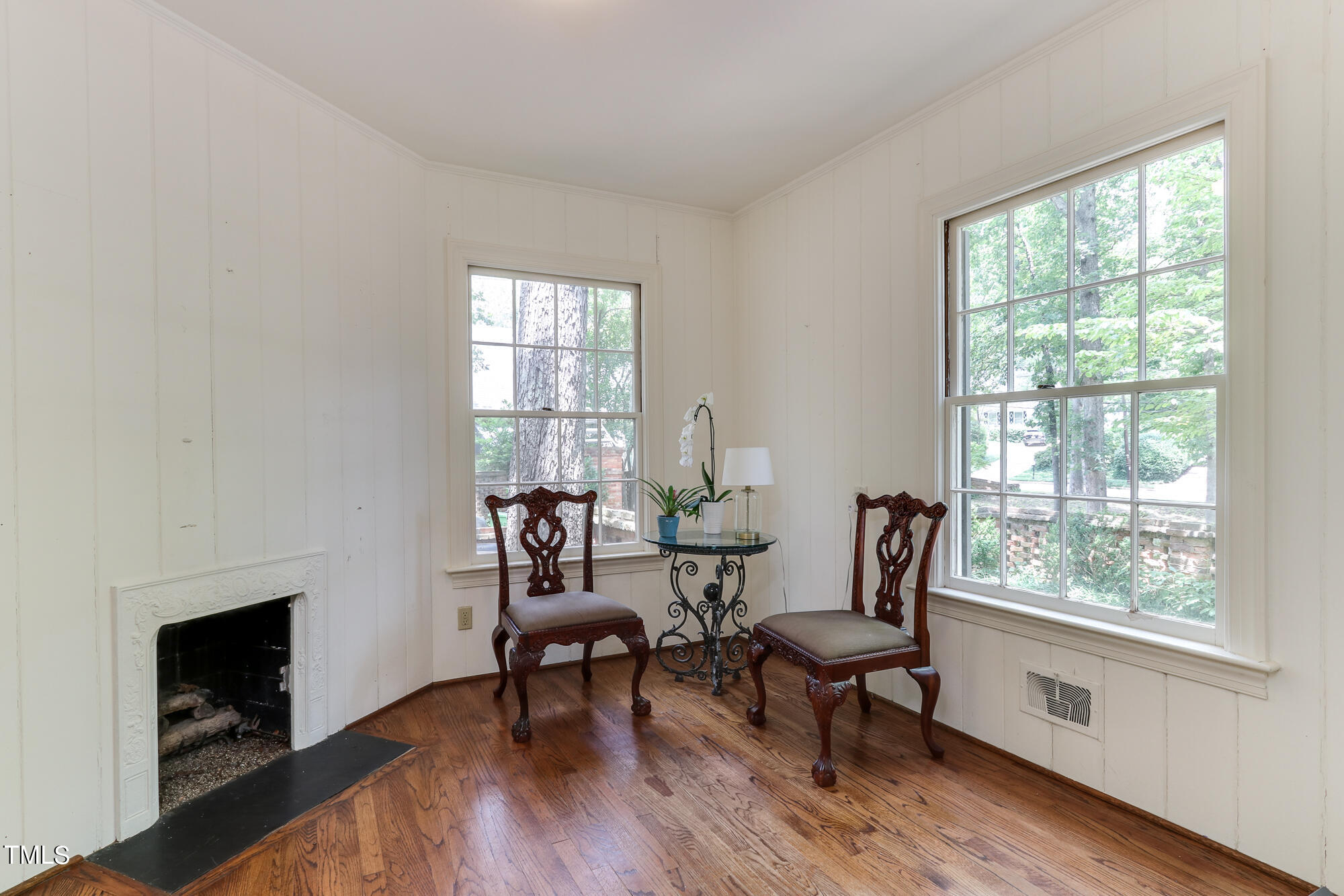 3231 Sussex Road Raleigh, NC 27607 - Photo 13 of 33 a living room with furniture and a fireplace