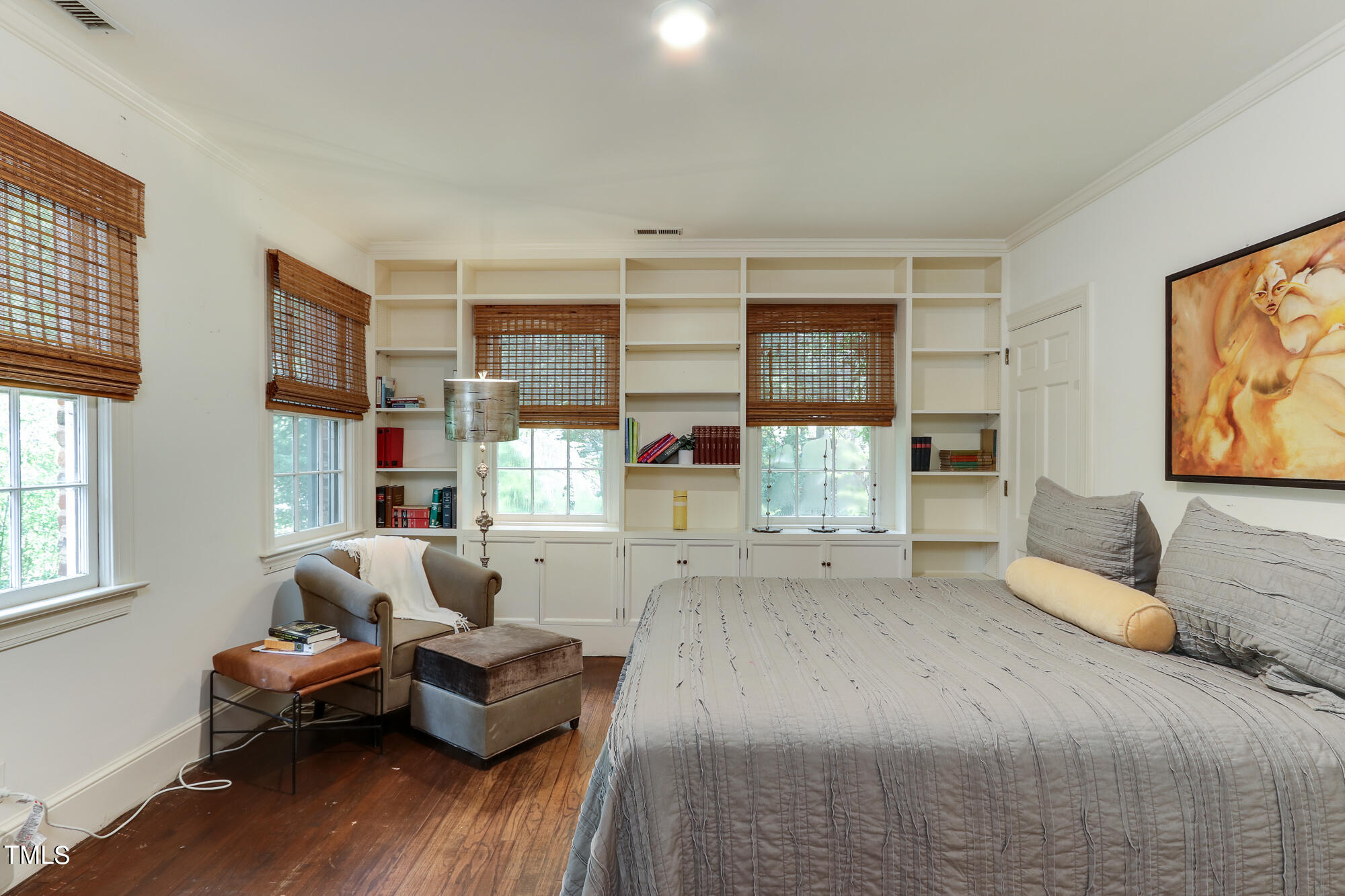 3231 Sussex Road Raleigh, NC 27607 - Photo 15 of 33 a bedroom with furniture and a large window