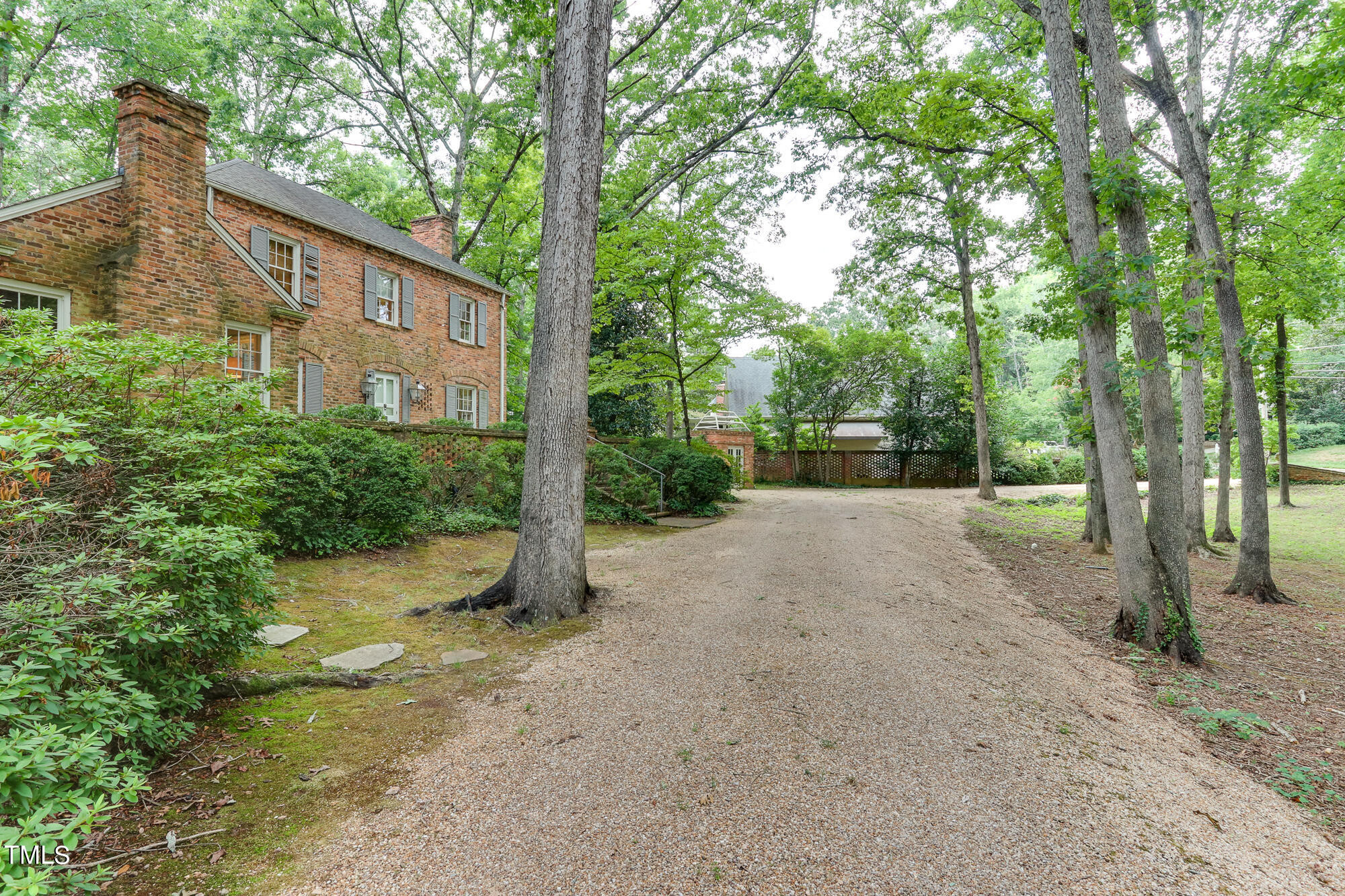 3231 Sussex Road Raleigh, NC 27607 - Photo 2 of 33 a view of a house with a tree in the background