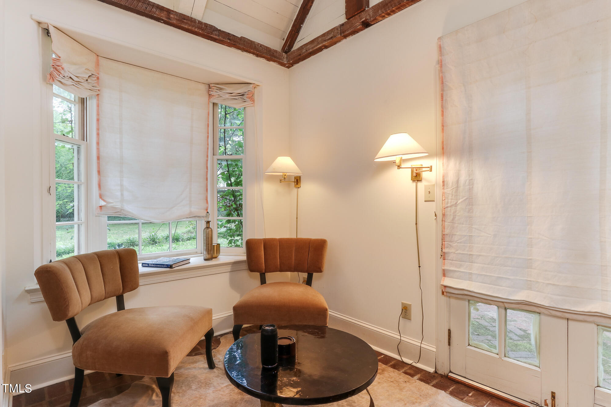 3231 Sussex Road Raleigh, NC 27607 - Photo 26 of 33 a living room with furniture and a window
