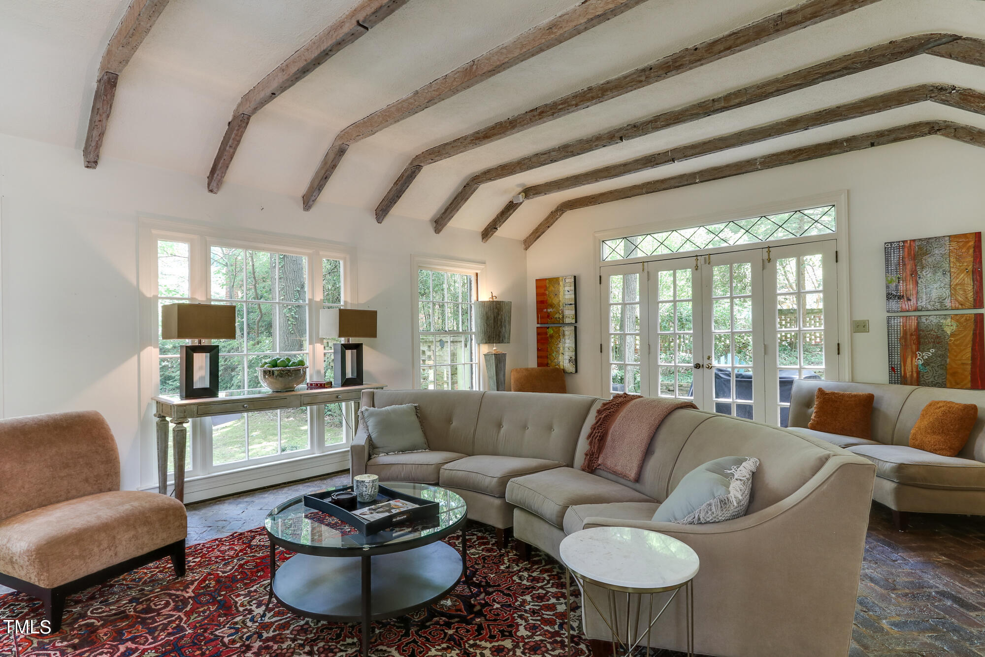 3231 Sussex Road Raleigh, NC 27607 - Photo 6 of 33 a living room with furniture and a large window