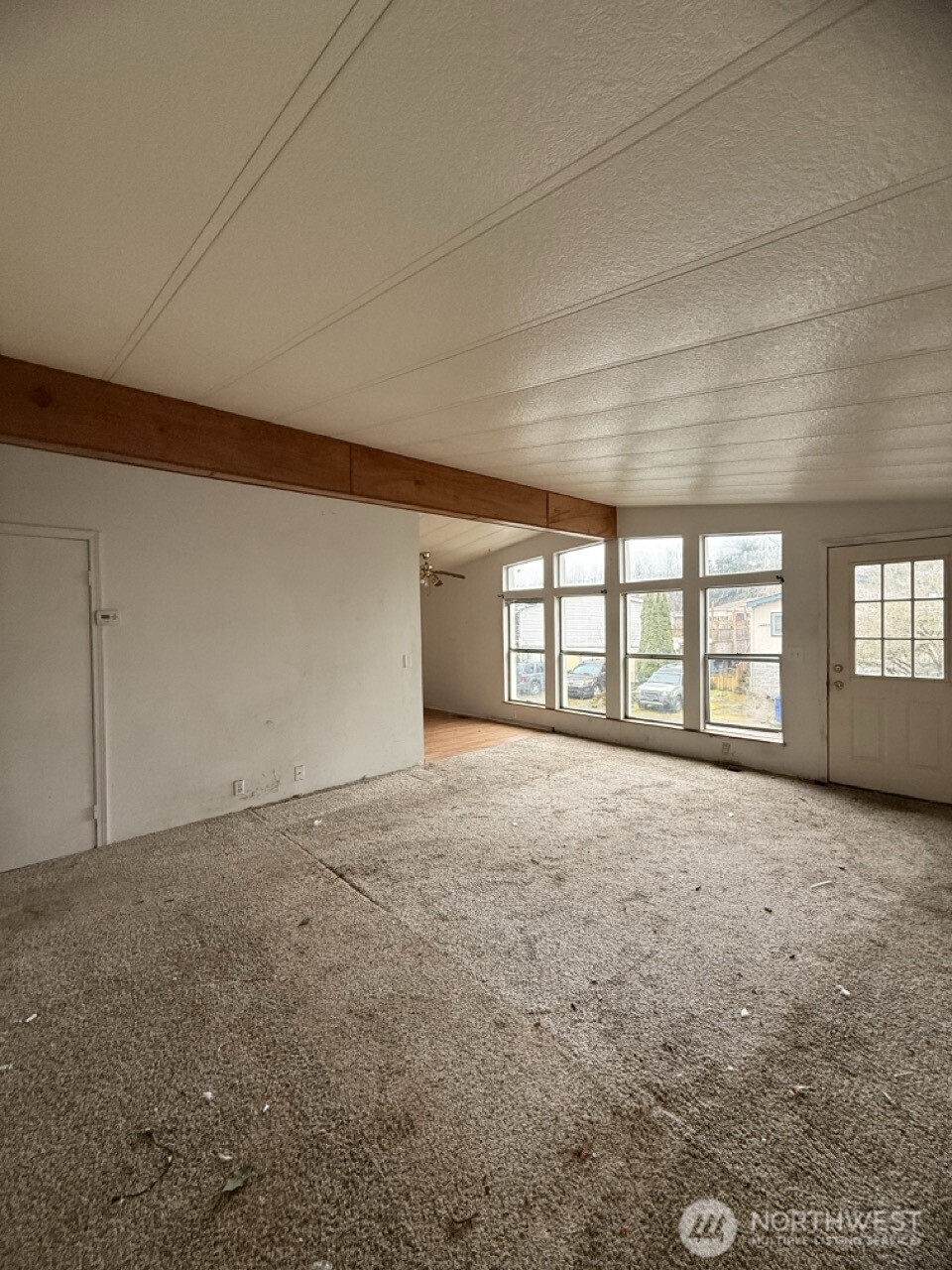 14003 70th Street East Sumner, WA 98390 - Photo 10 of 20 a view of an empty room with a window