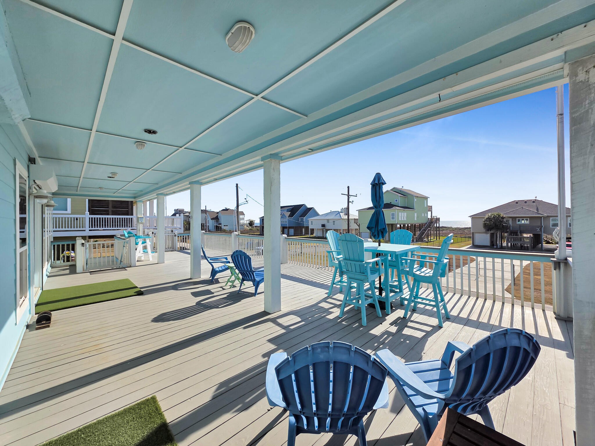 353 Atkinson Street Crystal Beach, TX 77650 - Photo 15 of 42 a view of a dining room with furniture window and outside view