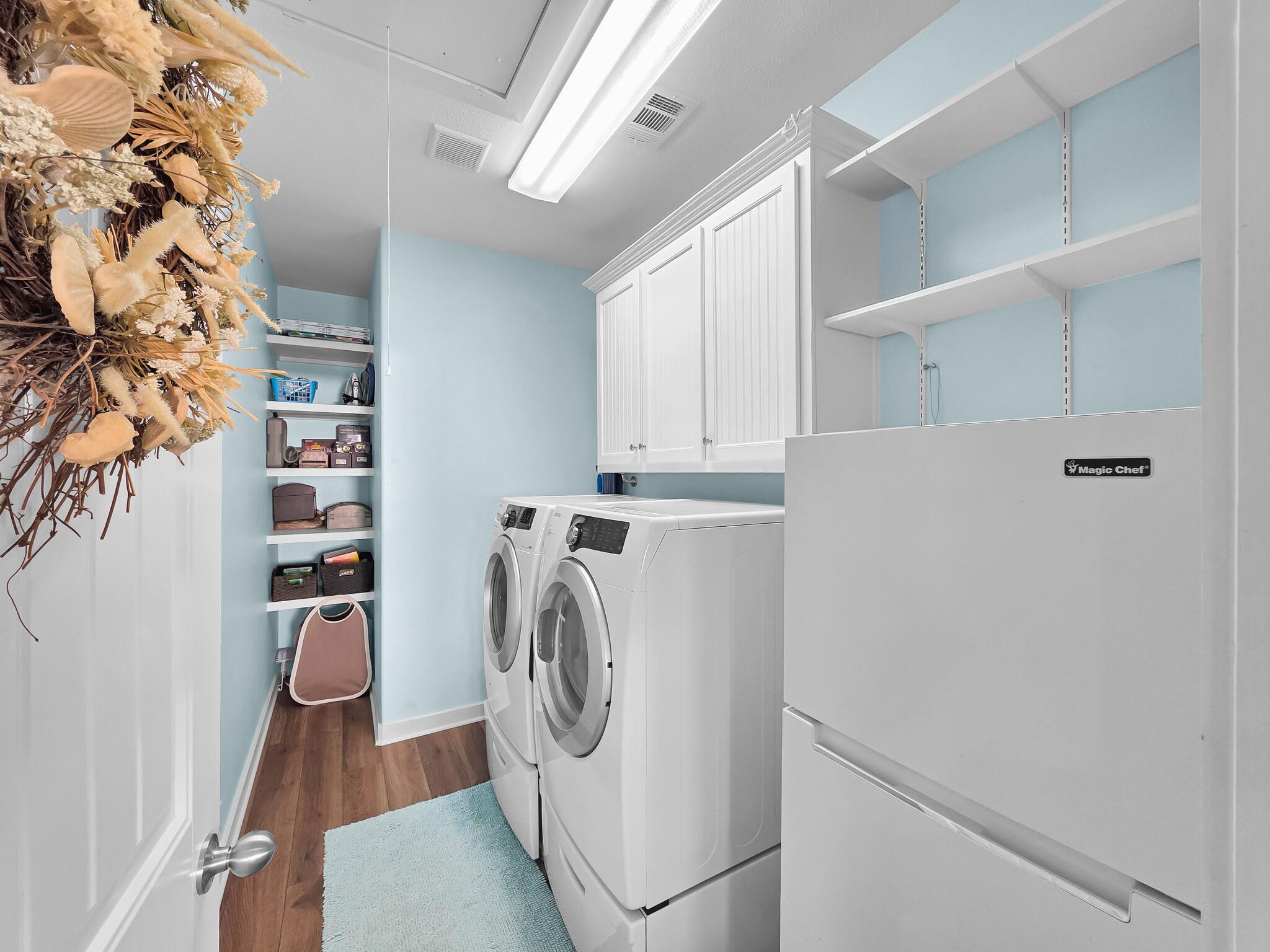 353 Atkinson Street Crystal Beach, TX 77650 - Photo 28 of 42 a utility room with dryer and washer
