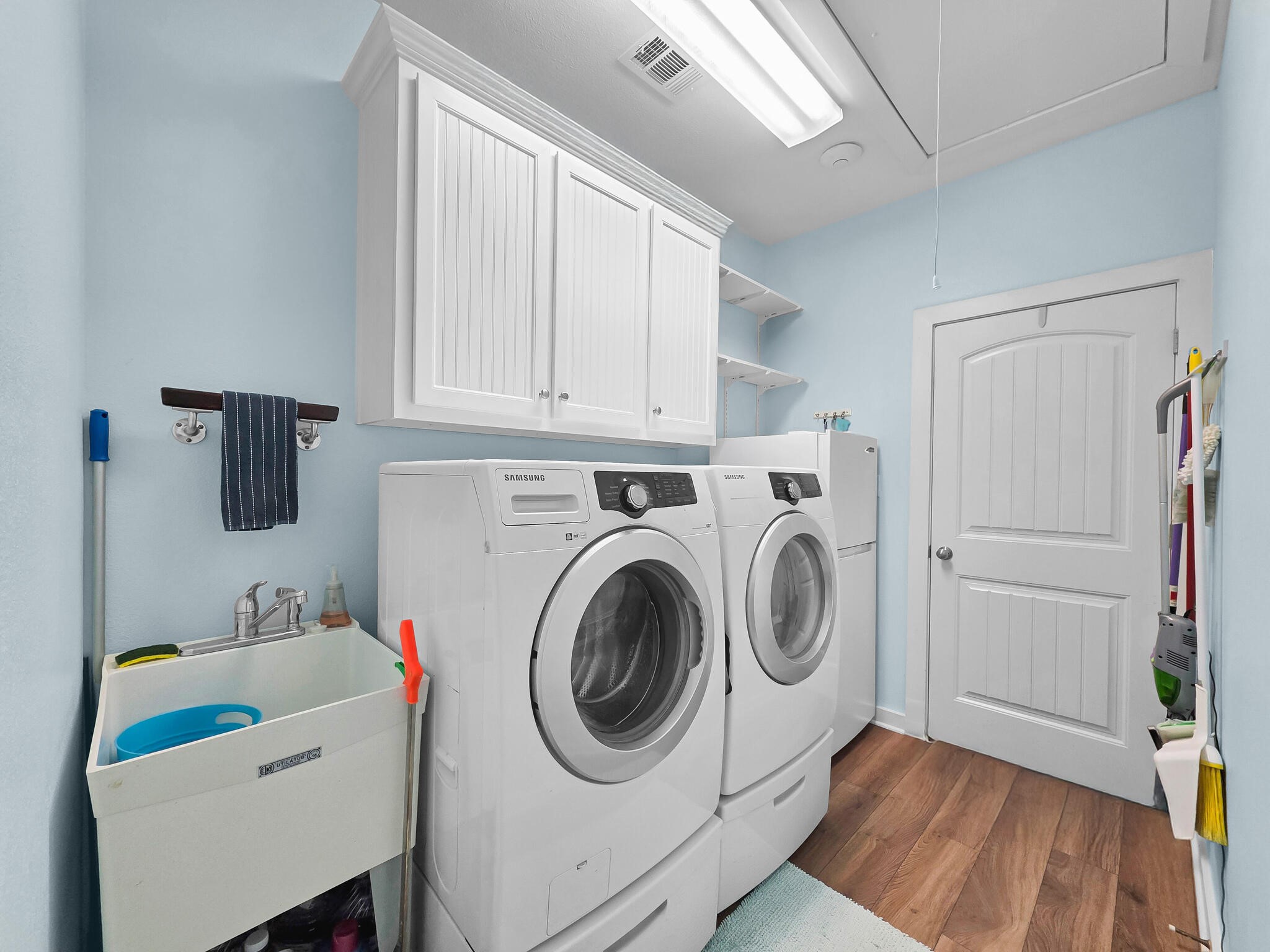 353 Atkinson Street Crystal Beach, TX 77650 - Photo 29 of 42 a utility room with dryer and washer