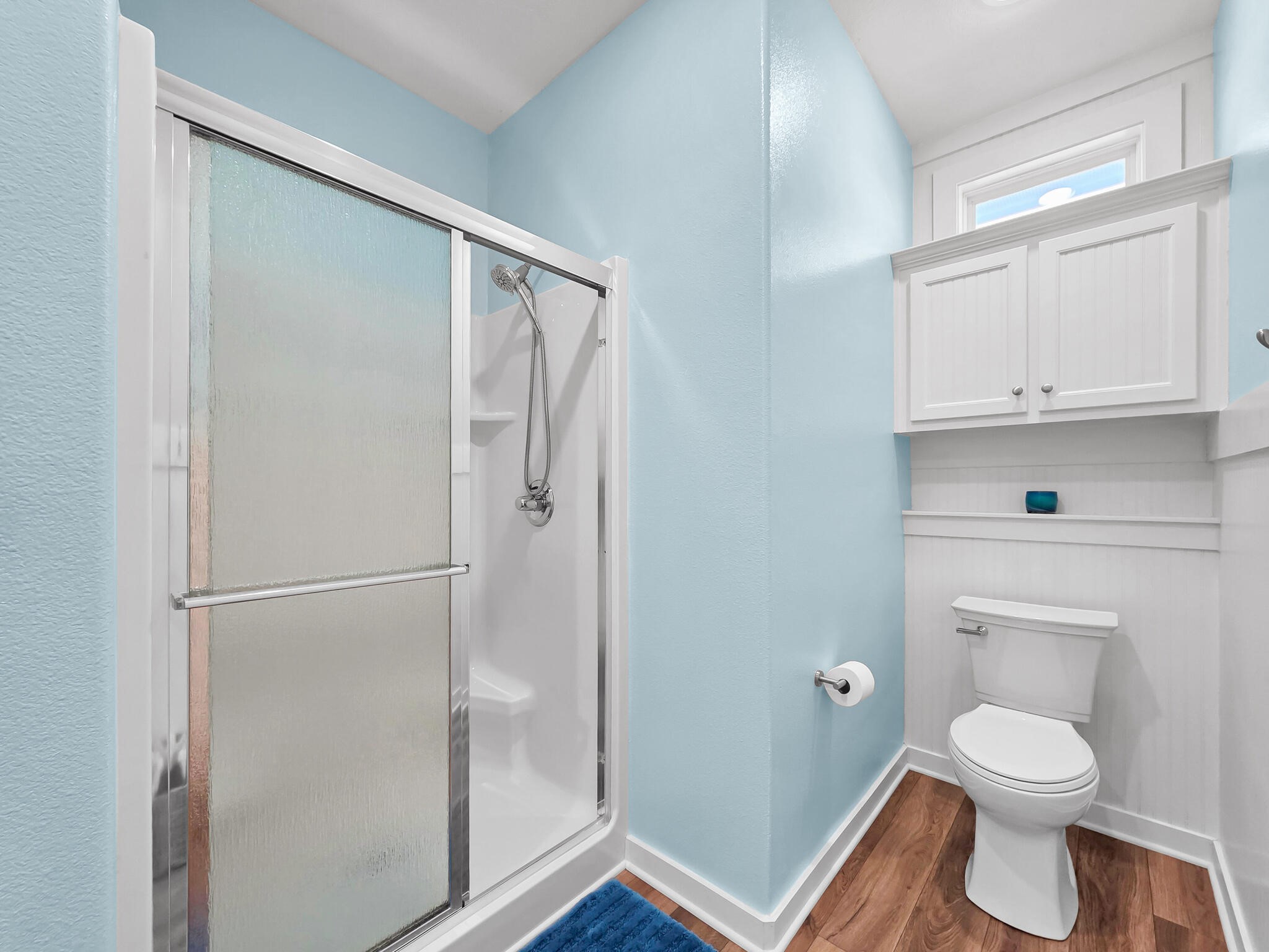 353 Atkinson Street Crystal Beach, TX 77650 - Photo 36 of 42 a bathroom with a toilet and a shower