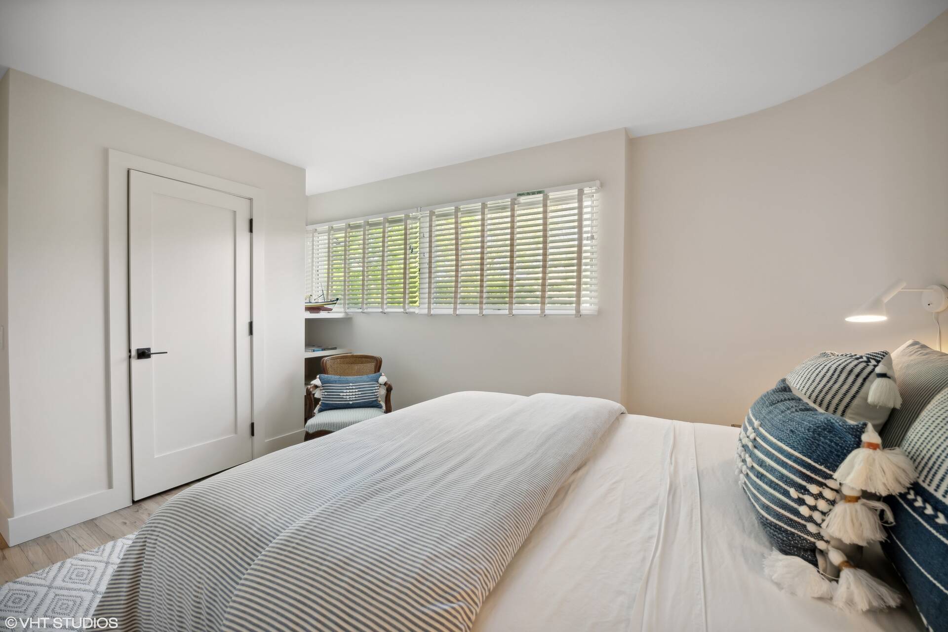 23 Winding Way Water Mill, NY 11976 - Photo 13 of 32 a bedroom with a bed and wooden floor