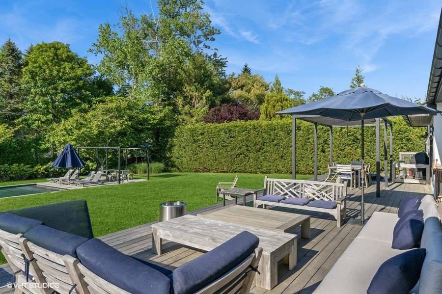 23 Winding Way Water Mill, NY 11976 - Photo 27 of 32 a view of a patio with a yard