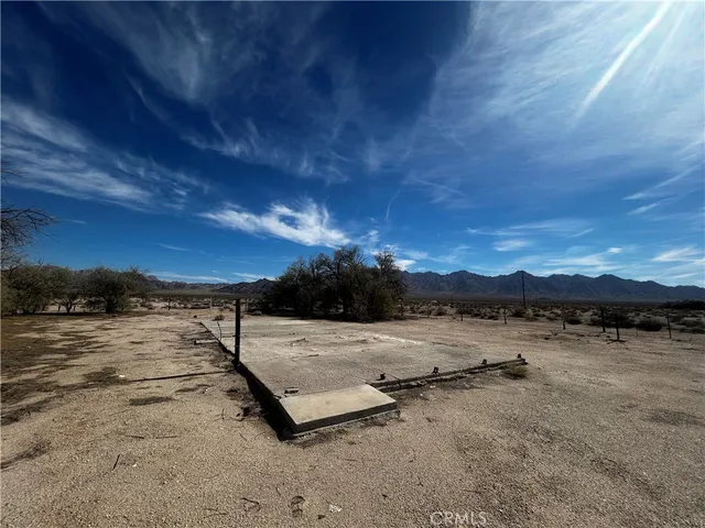 a view of a lake with sunset