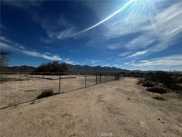 a view of patio with a yard