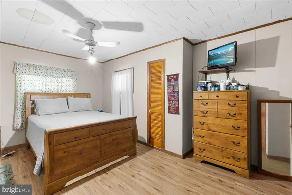 a bedroom with a bed and furniture