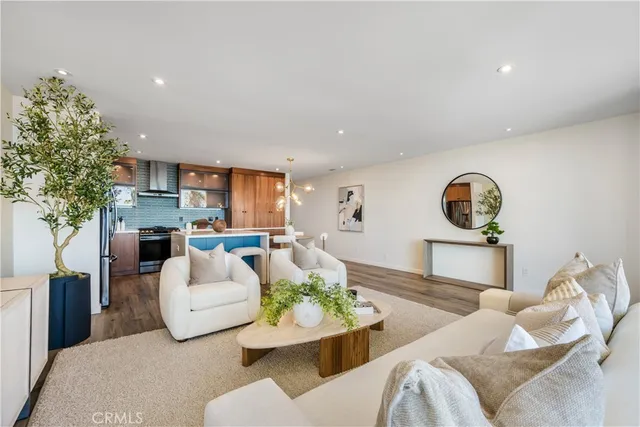 a kitchen with a refrigerator and a sink