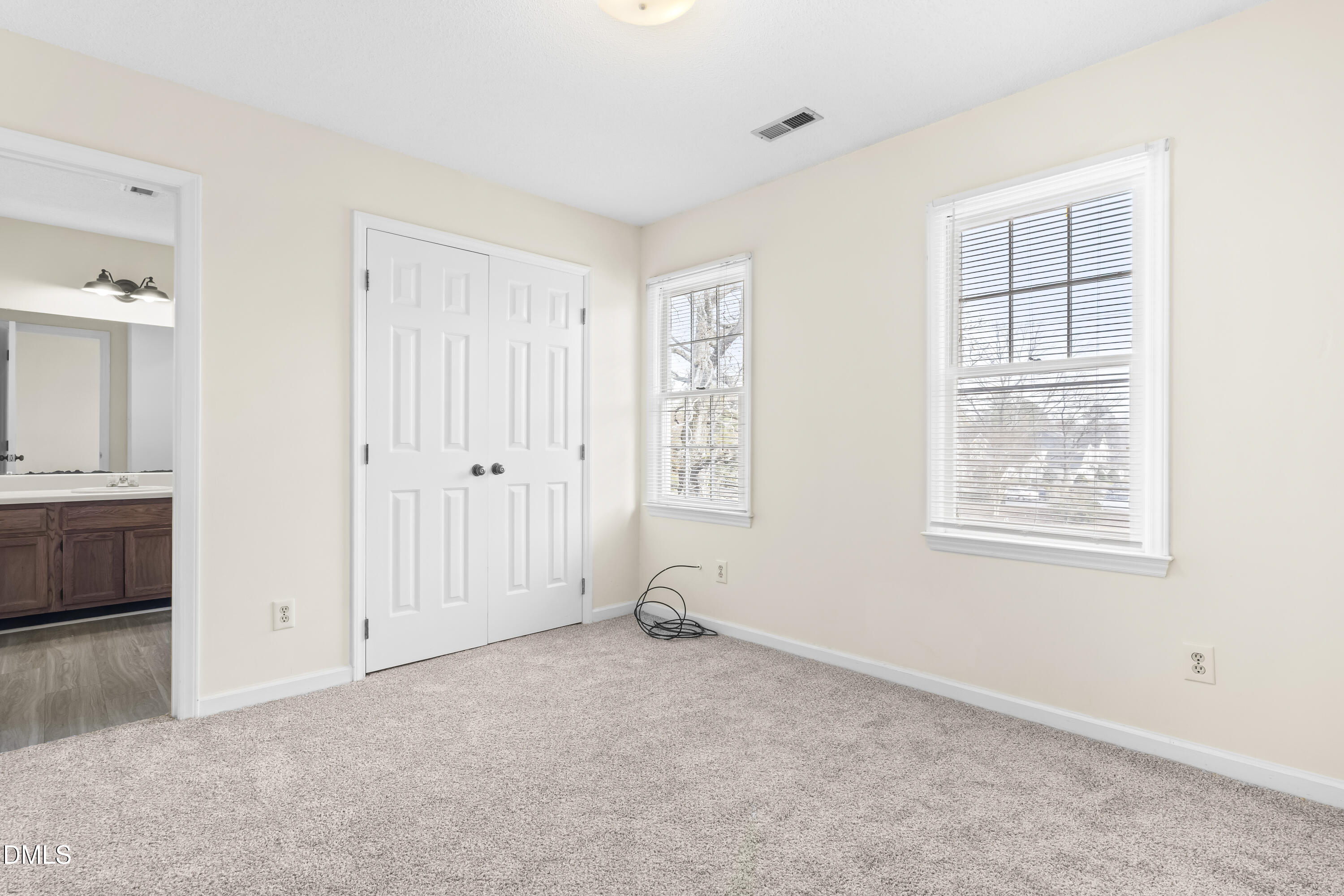 8031 Perry Creek Road Raleigh, NC 27616 - Photo 16 of 28 a view of an empty room with a window