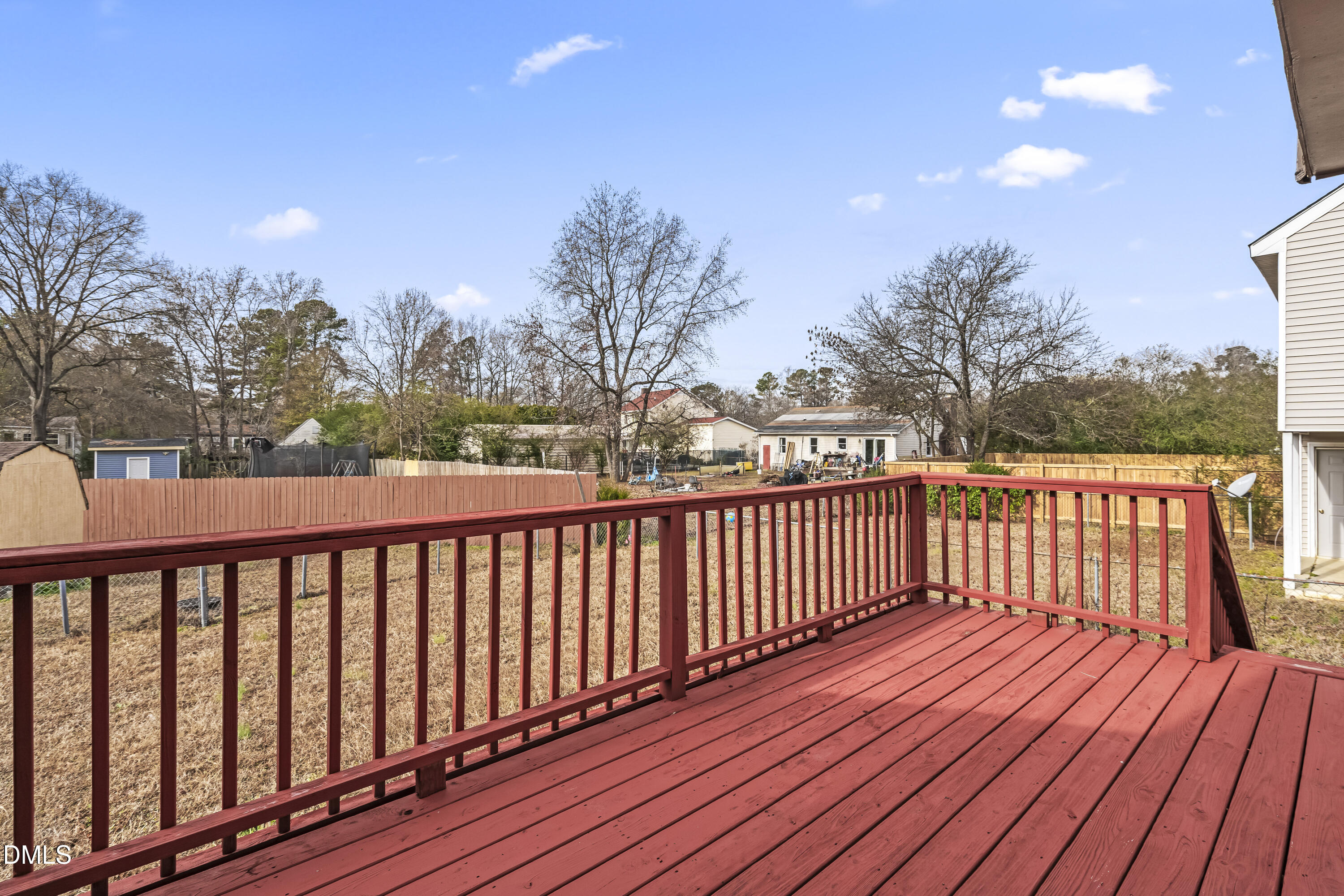 8031 Perry Creek Road Raleigh, NC 27616 - Photo 23 of 28 a balcony with wooden floor and outdoor space