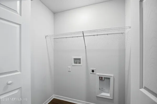 a view of a room that has a large window