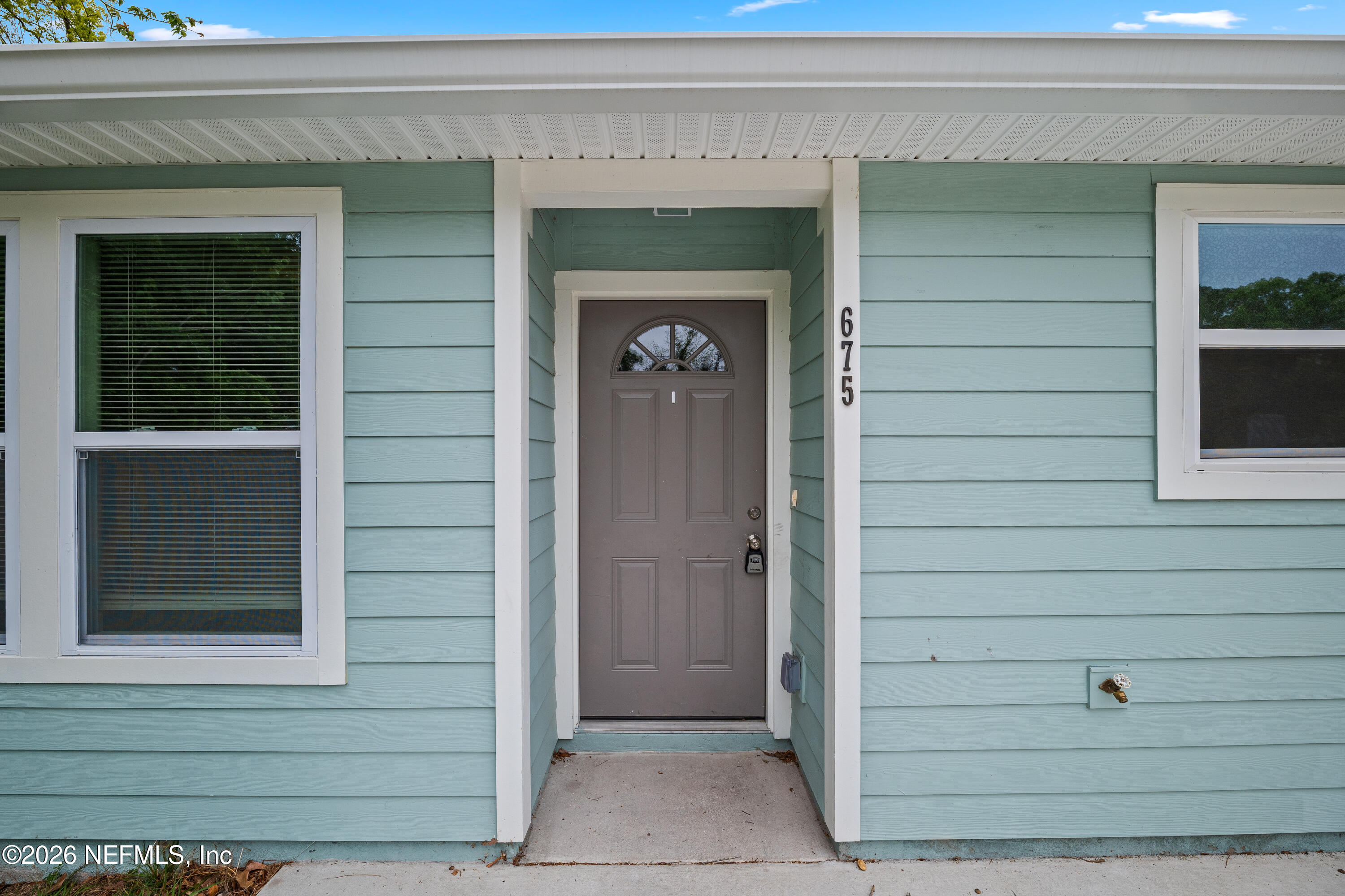 675 Moore Street Baldwin, FL 32234 - Photo 7 of 31 a view of front door of house