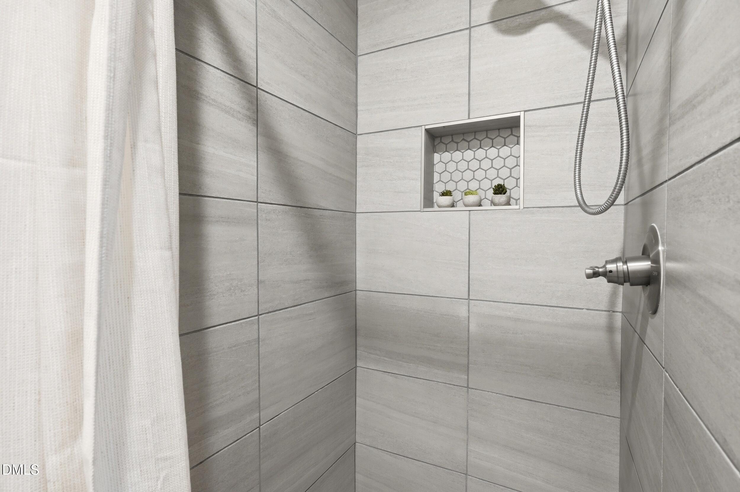 2301 Milburnie Road Raleigh, NC 27610 - Photo 15 of 23 a bathroom with a shower