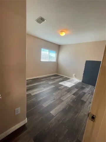 a bathroom with a tub and a sink