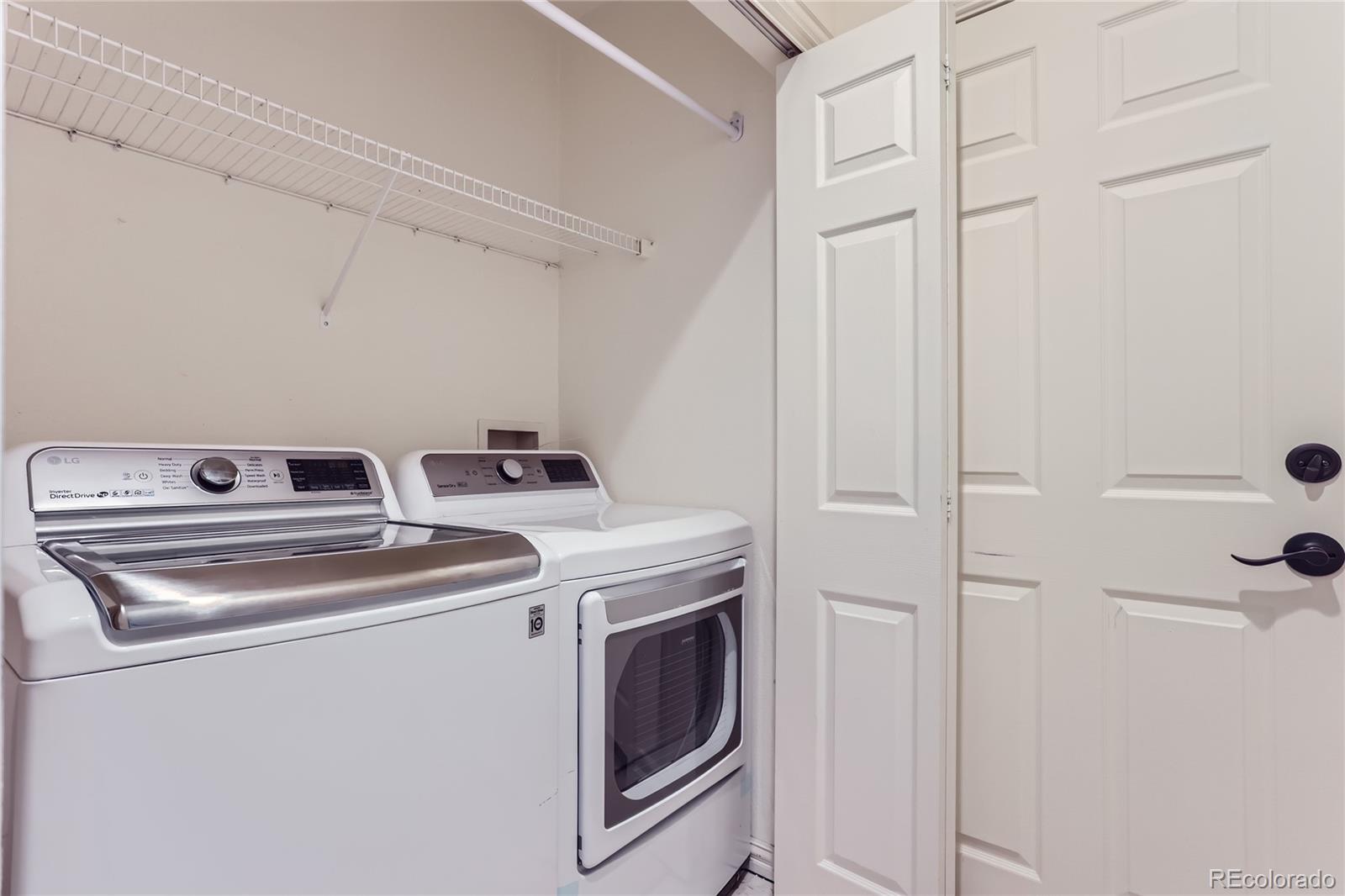 15 Jackson Street, Unit A Denver, CO 80206 - Photo 16 of 17 a utility room with dryer and washer