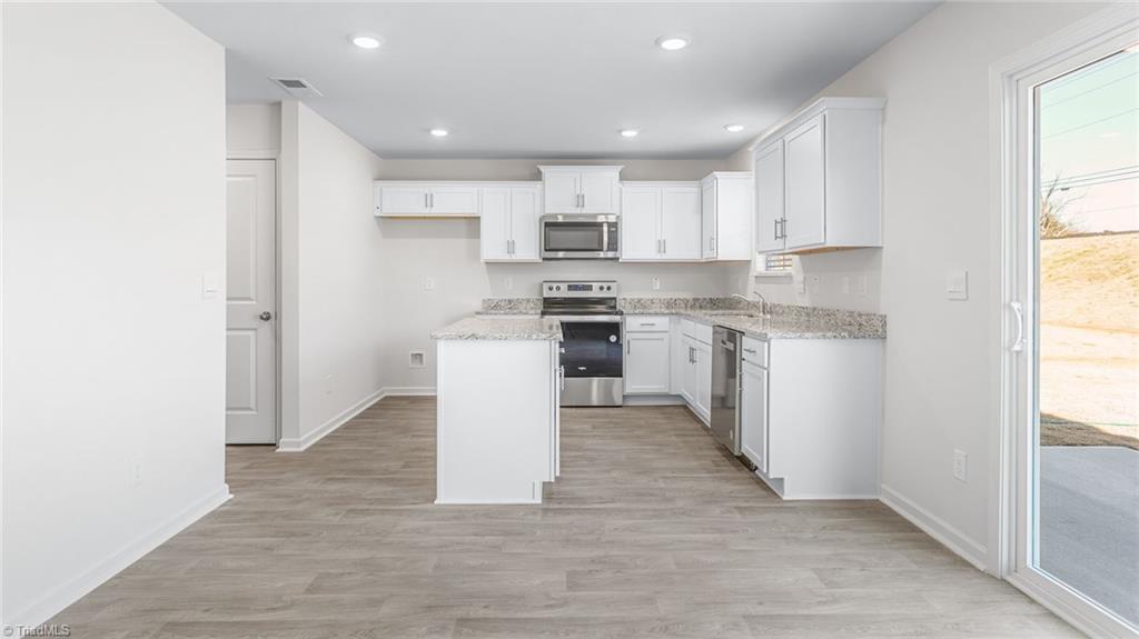 136 West Farm Loop Stokesdale, NC 27357 - Photo 9 of 28 *photos are of model home and are for representational purposes only.