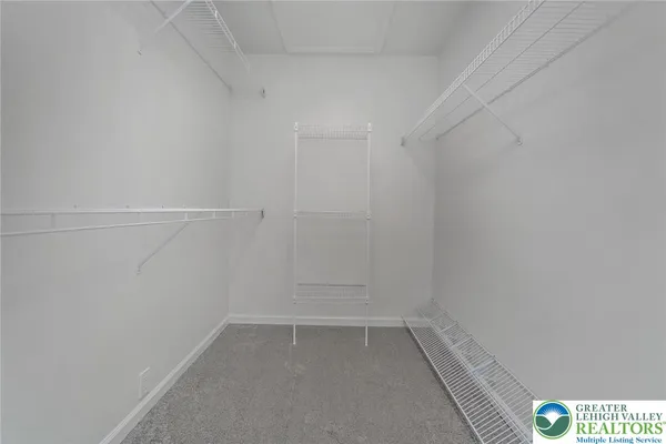 a view of a room with racks on the wall
