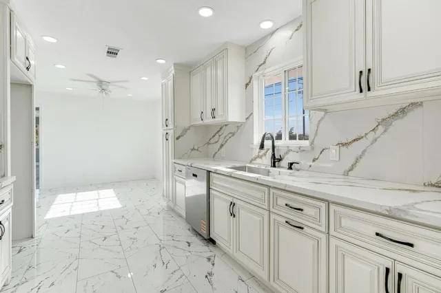 a bathroom with a double vanity sink and mirror