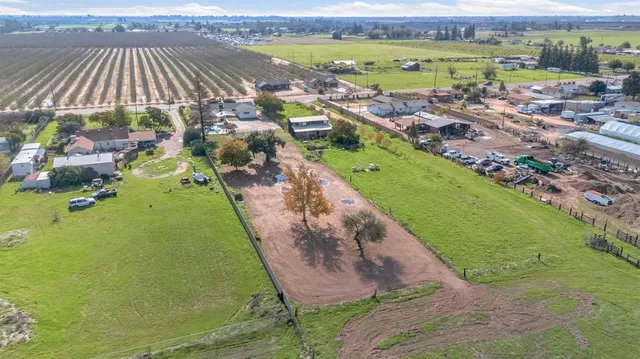 a view of a lake with a yard