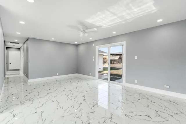 a view of a livingroom with a staircase