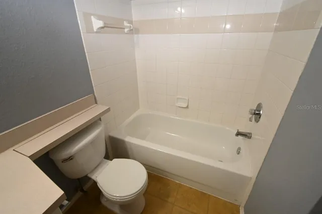 a bathroom with a sink and toilet