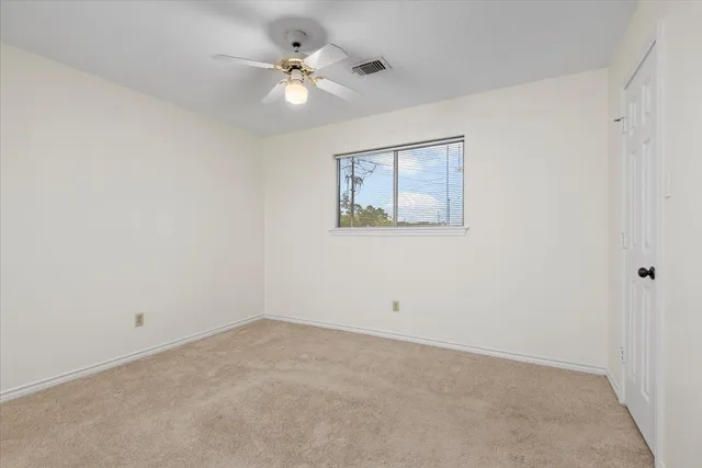 a bathroom with a sink vanity and a mirror