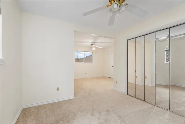 a bathroom with a sink double vanity and a mirror