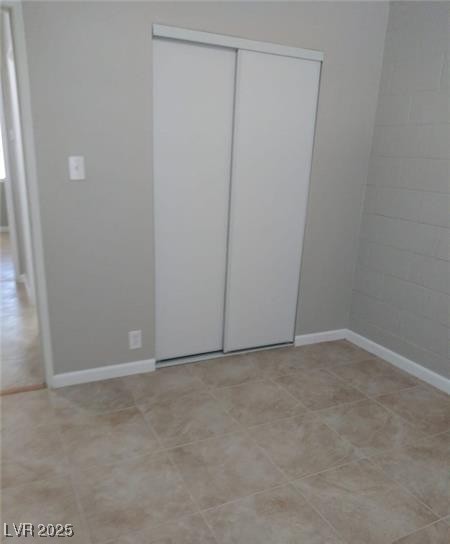 1909 Alwill Street, Unit C Las Vegas, NV 89106 - Photo 9 of 9 Unfurnished bedroom featuring a closet and baseboards