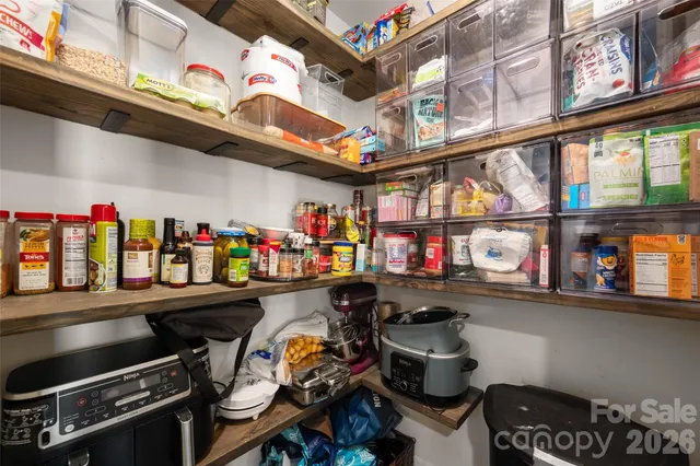 a store room with lots of different colored cloths
