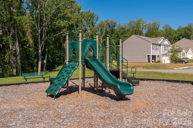 a view of a park with swings