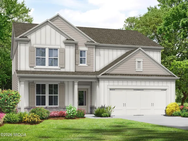 front view of a house with a yard