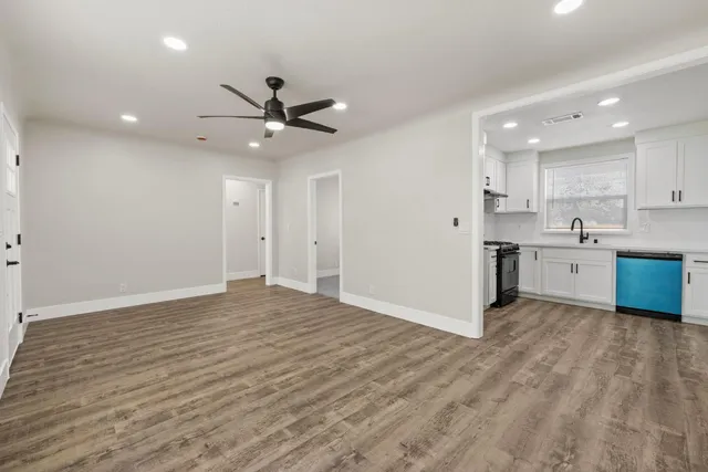 a view of kitchen with wooden floor and window